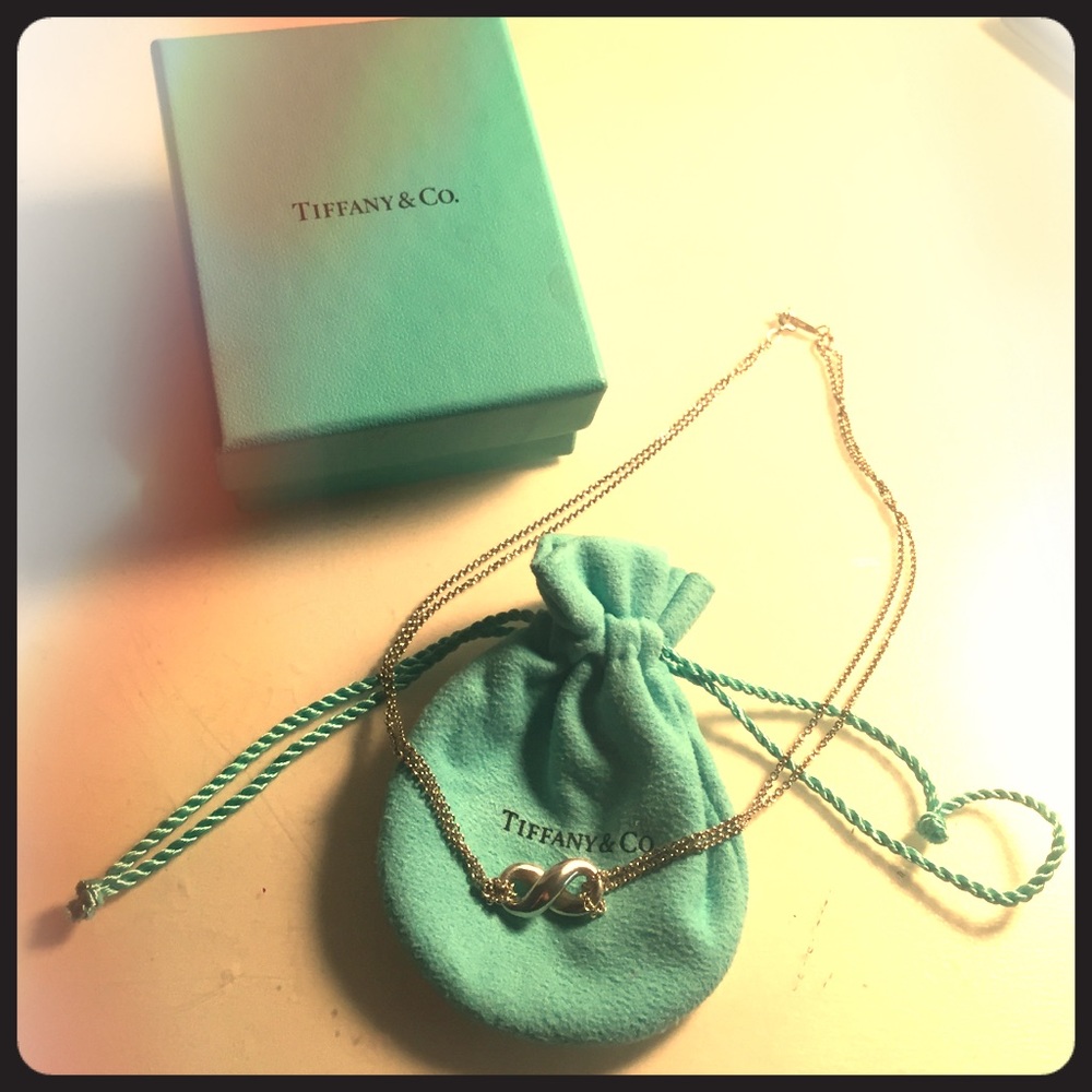 Authentic Tiffany Infinity pendant in sterling silver!!